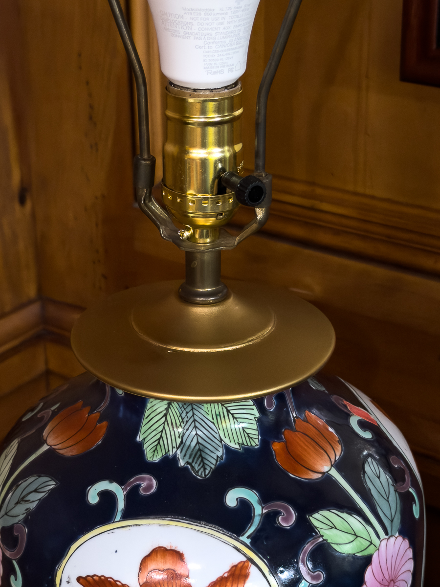up close of brass lamp top