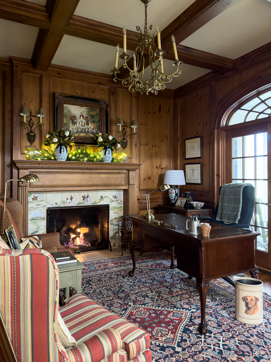 Vintage Facebook Marketplace lamp with block‑print shade styled on a wood desk in a pine‑paneled study