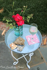 Small outdoor table makeover by our southern home using an old upcycled base and supplies from Walmart #themedfurnituremakeoverday
