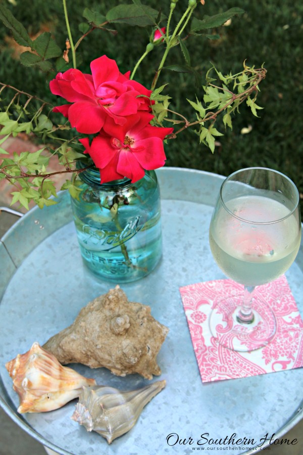 Small outdoor table makeover by our southern home using an old upcycled base and supplies from Walmart #themedfurnituremakeoverday