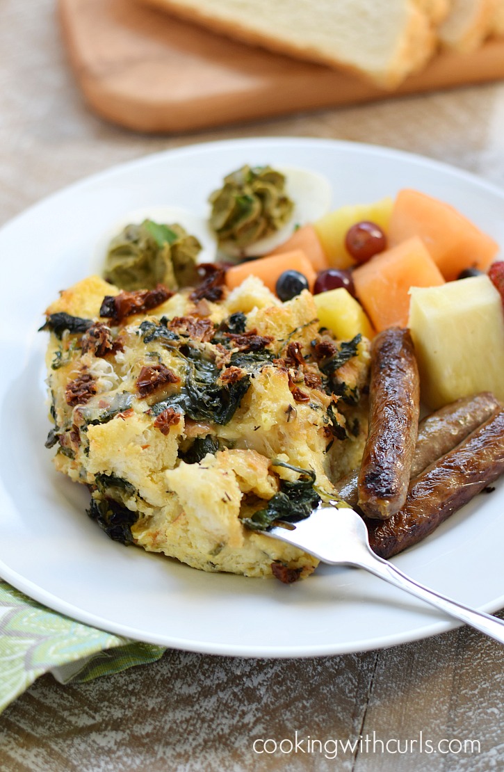 Sourdough Breakfast Strata with sun-dried tomatoes, spinach and fontina cheese is the perfect way to start the day | cookingwithcurls.com #Switch2Sourdough #ad
