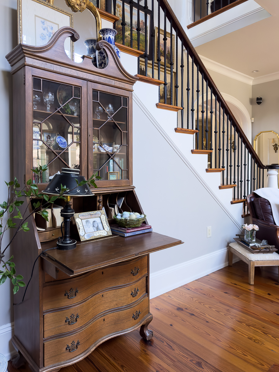 secretary by staircase