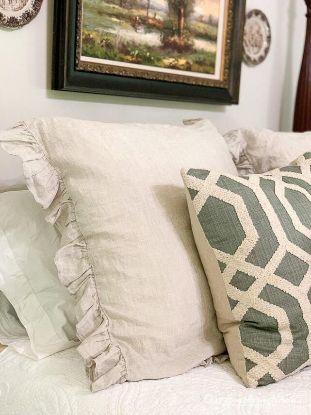 ruffled pillows on a rice bed