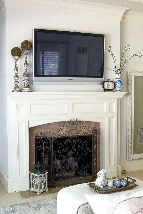 fireplace with TV in master bedroom