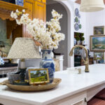 white quartz kitchen counters with grand millennial decor