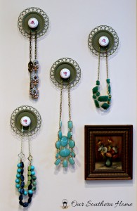 Jewelry Hangers made with coasters and cabinet knobs from a thrift store by Our Southern Home #SwapItLikeItsHot