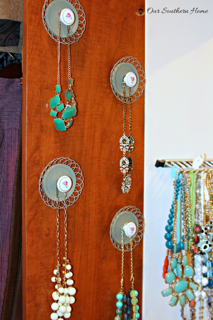 Jewelry Hangers made with coasters and cabinet knobs from a thrift store by Our Southern Home #SwapItLikeItsHot