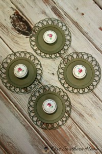 Jewelry Hangers made with coasters and cabinet knobs from a thrift store by Our Southern Home #SwapItLikeItsHot