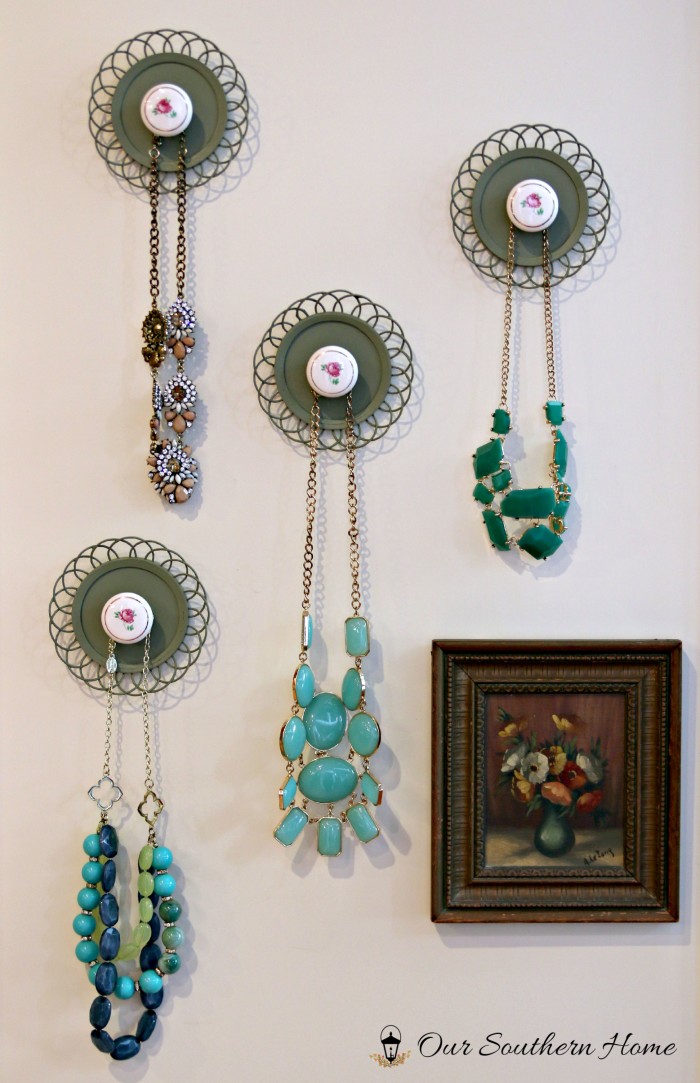 Jewelry Hangers made with coasters and cabinet knobs from a thrift store by Our Southern Home #SwapItLikeItsHot