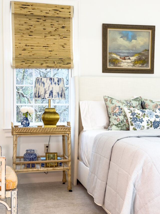 guest bedroom with florals and wicker