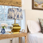 guest bedroom with pleated lamp shade