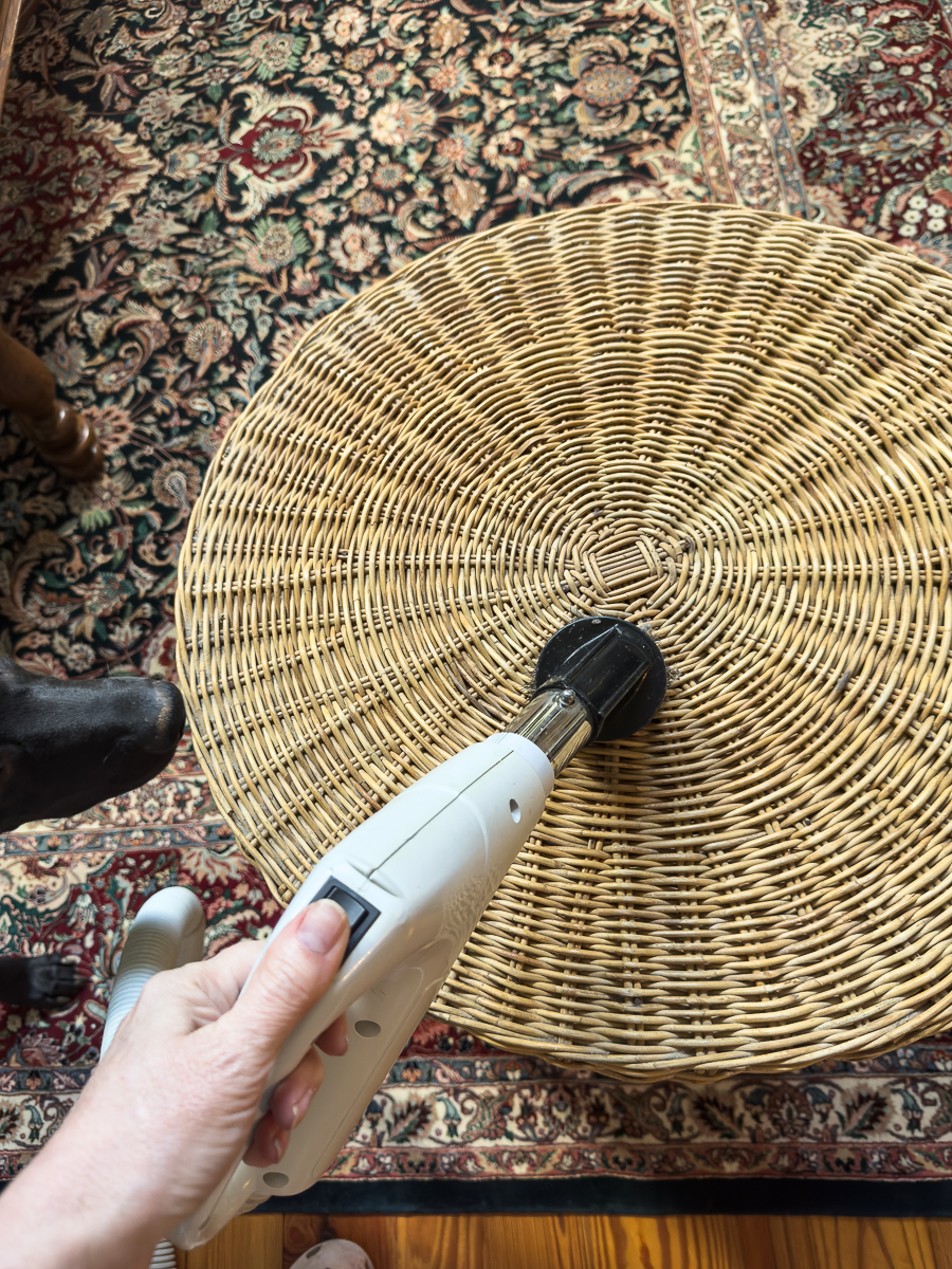 vacuum the table of dirt