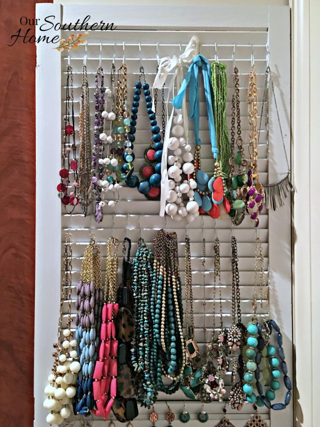 What a cool idea! Old thrift store shutters are perfect to organize your jewelry. Our Southern Home has all the details!