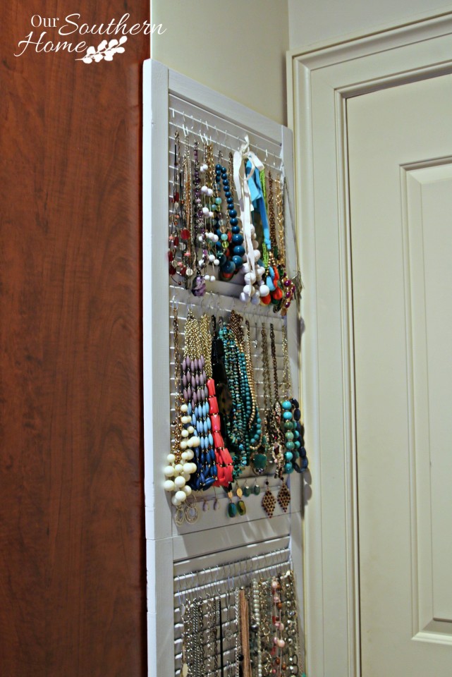 What a cool idea! Old thrift store shutters are perfect to organize your jewelry. Our Southern Home has all the details!