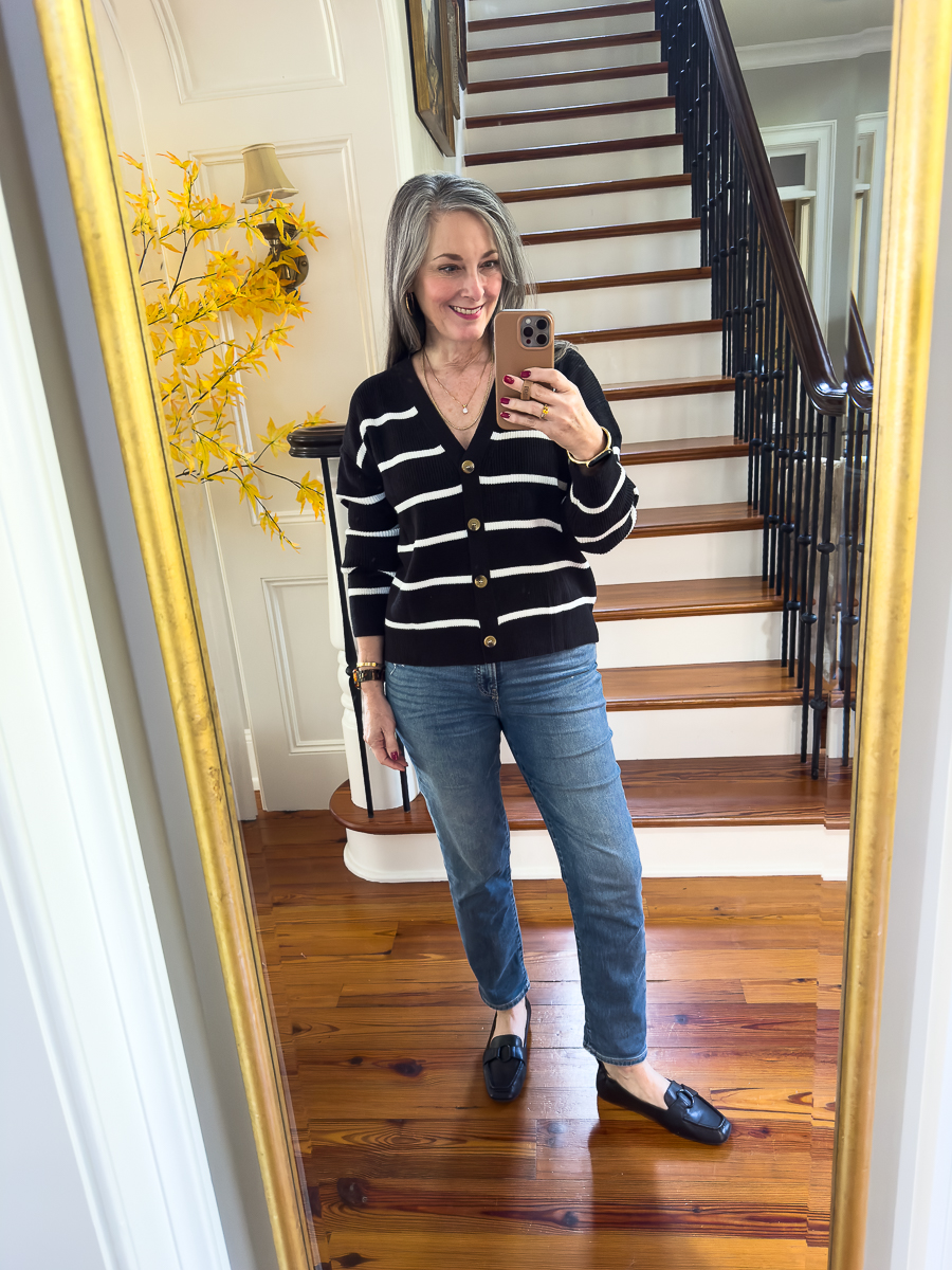 woman in black striped v-neck sweater
