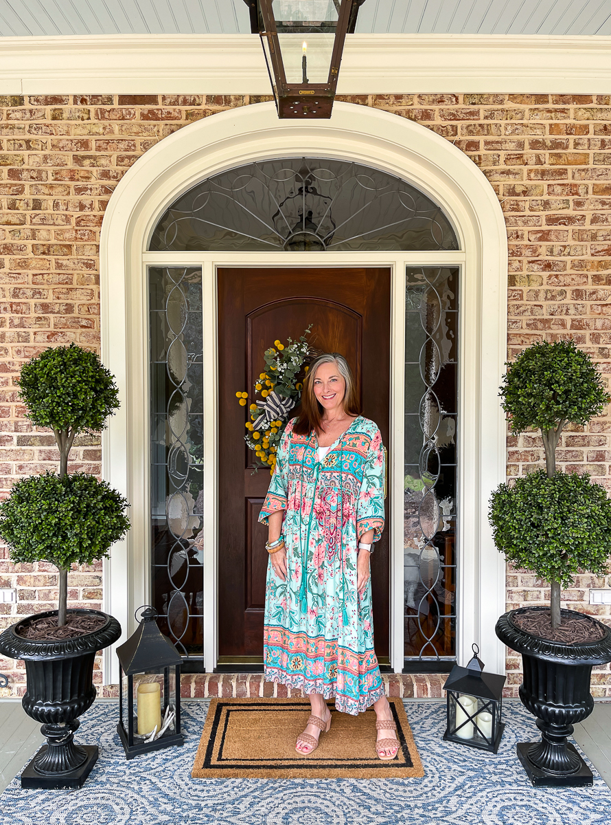 woman on porch in dress