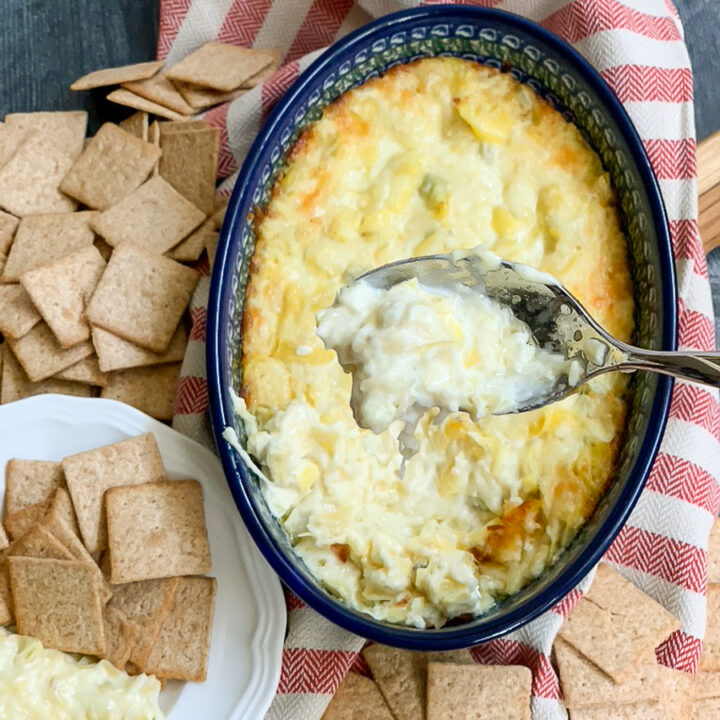 https://www.oursouthernhomesc.com/wp-content/uploads/baked-artichoke-dip-oursouthernhomesc.com-2-720x720.jpg