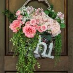 Cottage farmhouse style basket wreath is this month's thrift store makeover! Many ideas brought to you each month from the team! #thriftstore #makeover #wreath #basketwreath #frontdoor