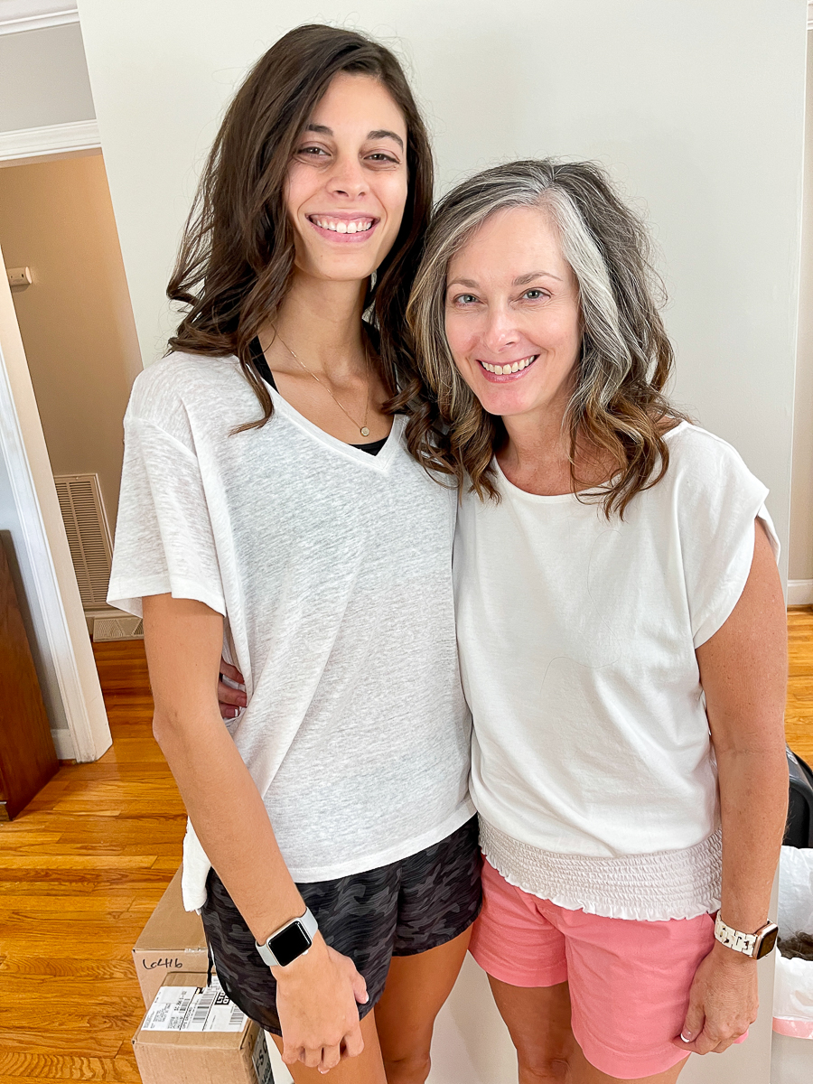 mom and daughter getting hair done