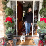 christy in doorway with bentley