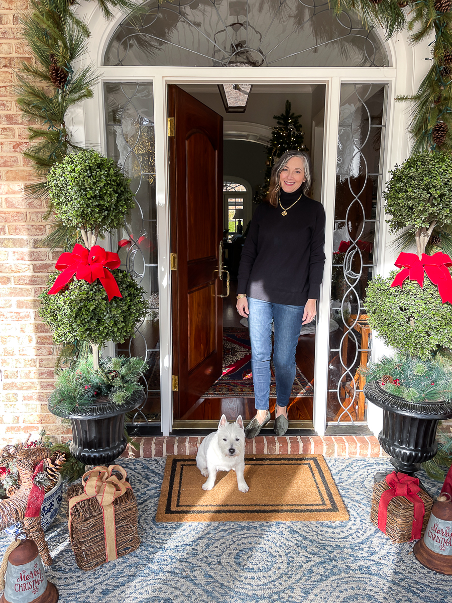 christy in doorway with bentley