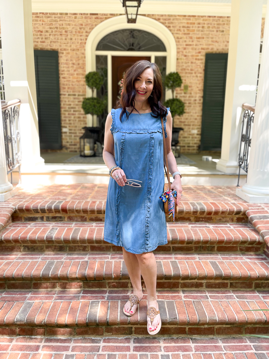 lady in a blue dress on steps