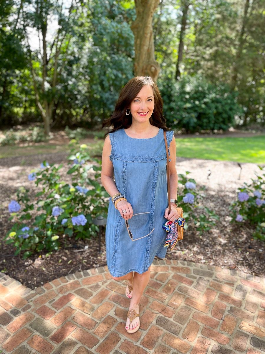 lady in blue dress on walkway