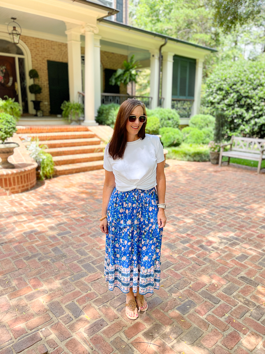 woman in floral skirt