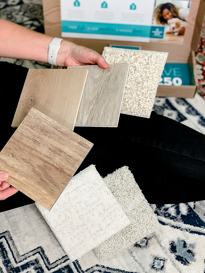 girl viewing flooring samples