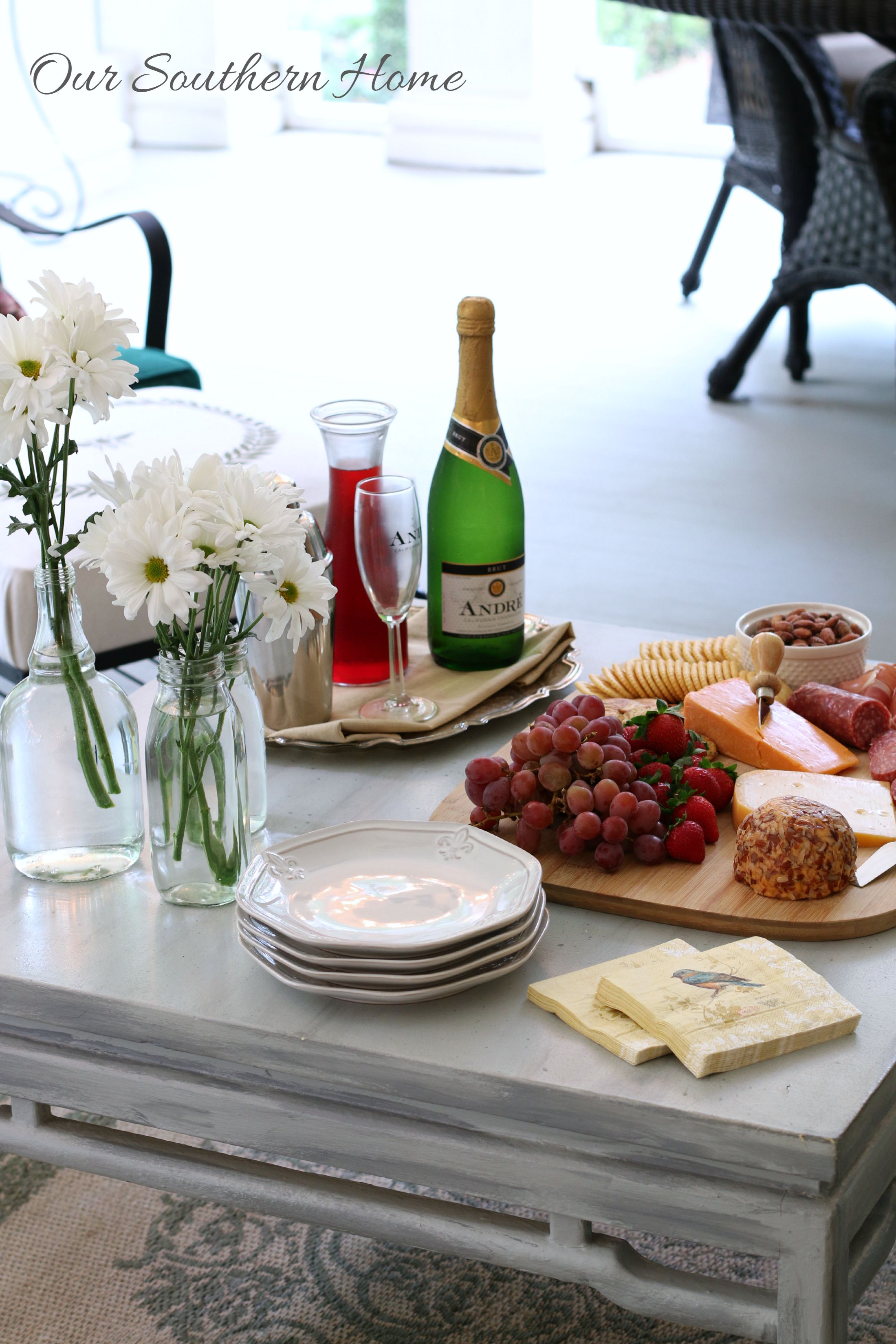 Celebrate at home with ideas from Our Southern Home. You can create a beautiful evening in with just a trip to the grocery store! #sp #epicwithandre