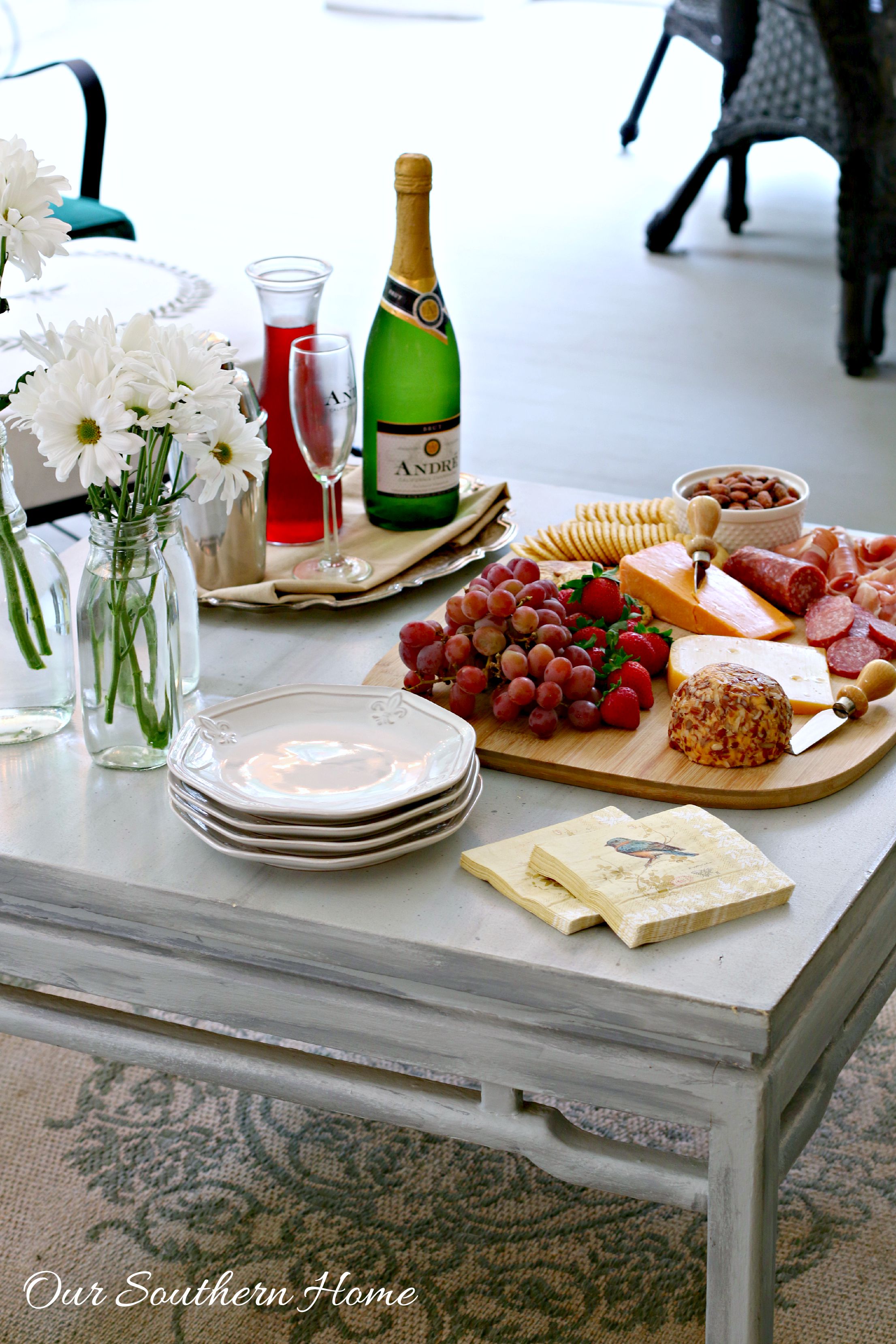 Celebrate at home with ideas from Our Southern Home. You can create a beautiful evening in with just a trip to the grocery store! #sp #epicwithandre