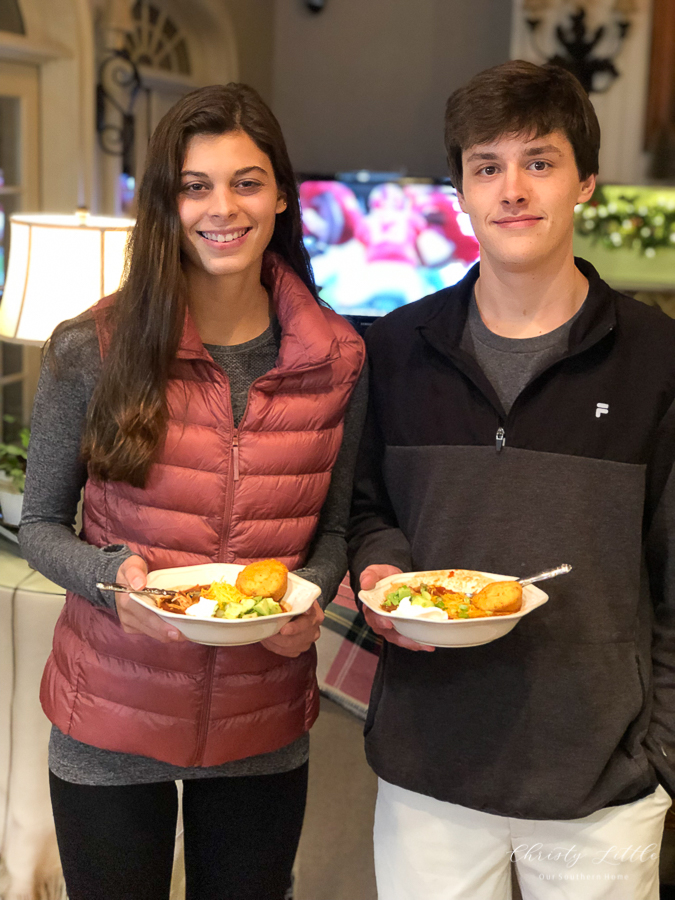 kids holding soup