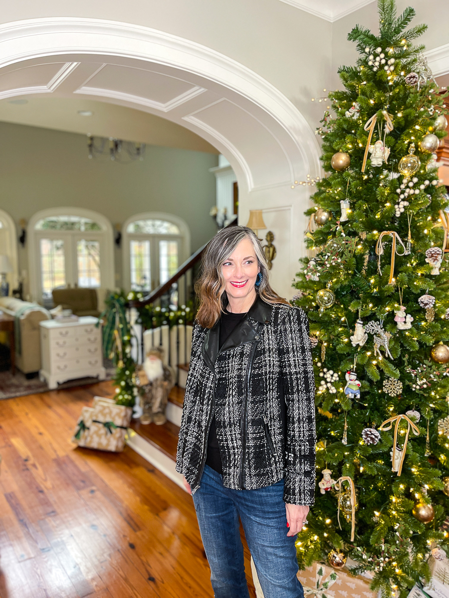 woman by christmas tree