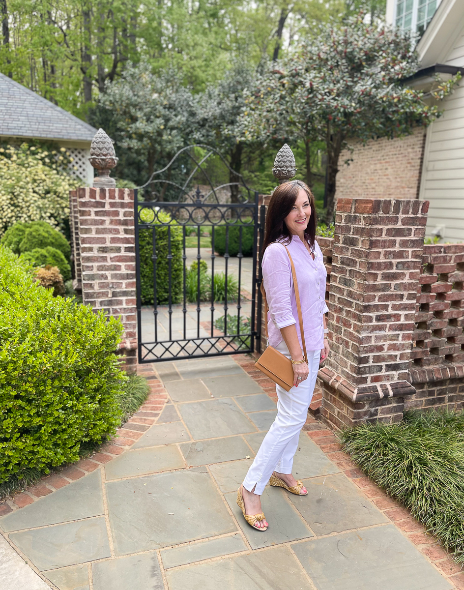 woman standing by gate