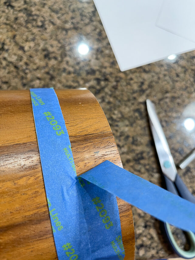 pulling tape off of ice bucket