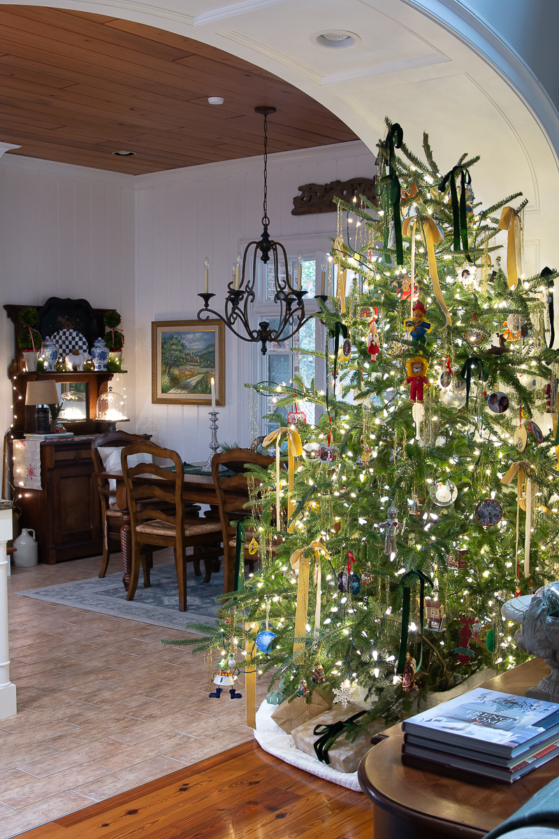 fresh christmas tree with collected ornaments