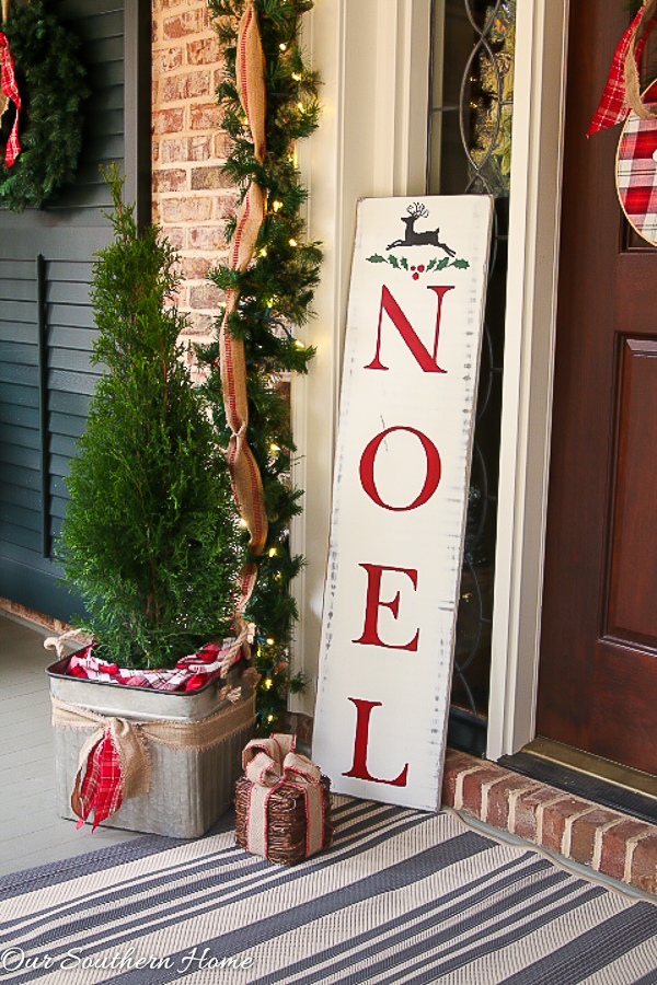 Large, southern front porch decked out for the holidays. So many great DIY and affordable ideas!