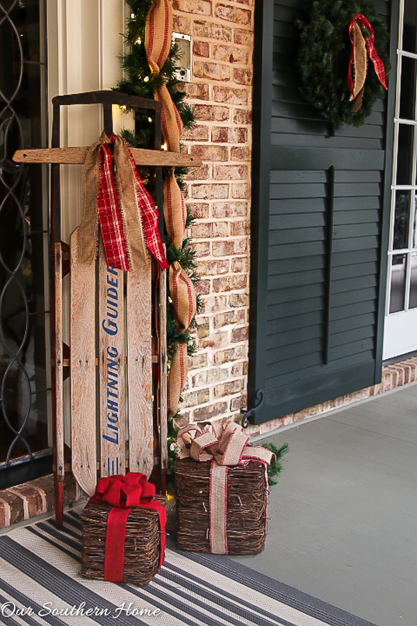 Large, southern front porch decked out for the holidays. So many great DIY and affordable ideas!