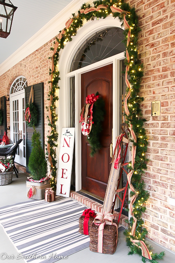 Large, southern front porch decked out for the holidays. So many great DIY and affordable ideas!