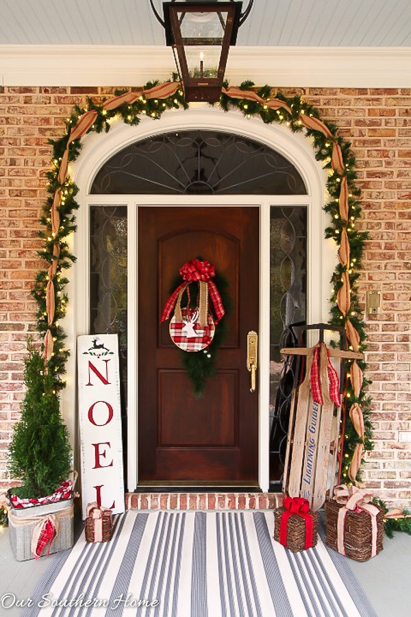 Large, southern front porch decked out for the holidays. So many great DIY and affordable ideas!