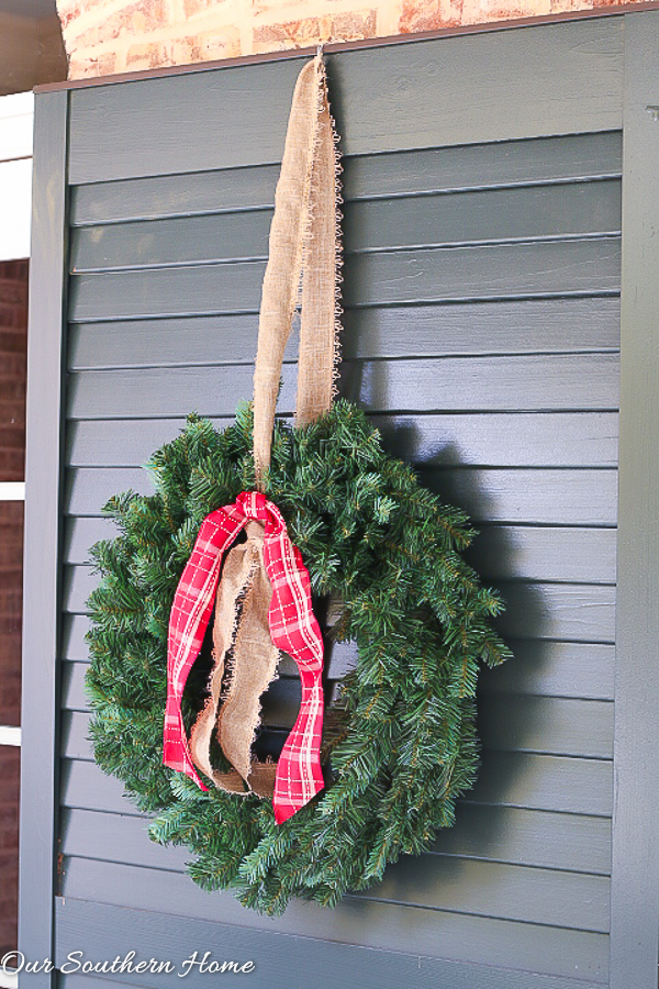 Large, southern front porch decked out for the holidays. So many great DIY and affordable ideas!