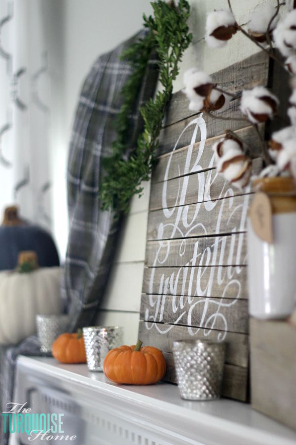 Plaids, neutrals and a few pops of autumnal color bring this message of gratitude home. I love the sweet reminder to be grateful this season - and always! | Grateful Fall Mantel | Details at TheTurquoiseHome.com