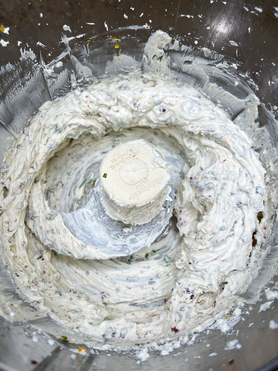 mixing cheeses in a food processor
