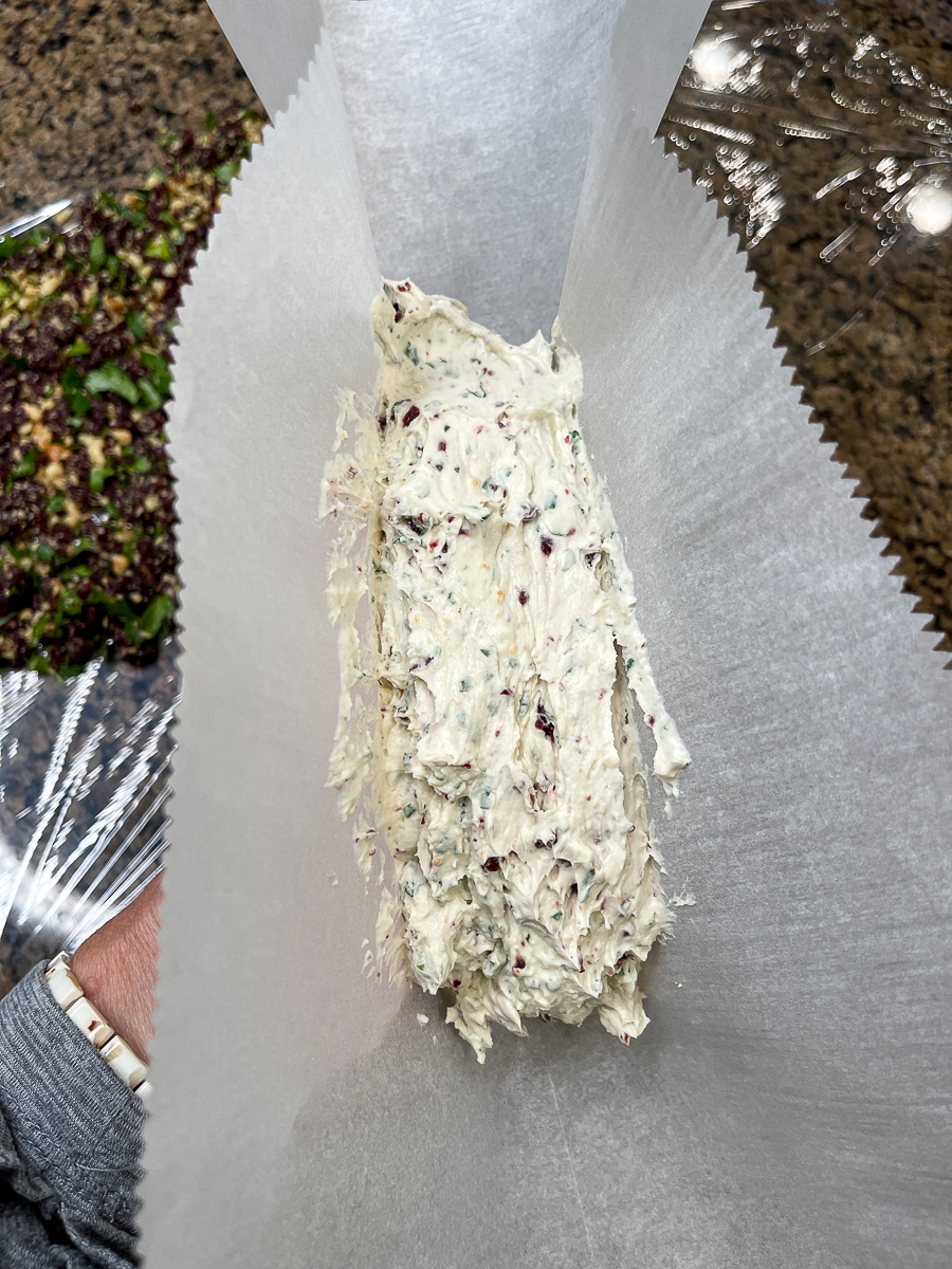 goat cheese log on parchment paper