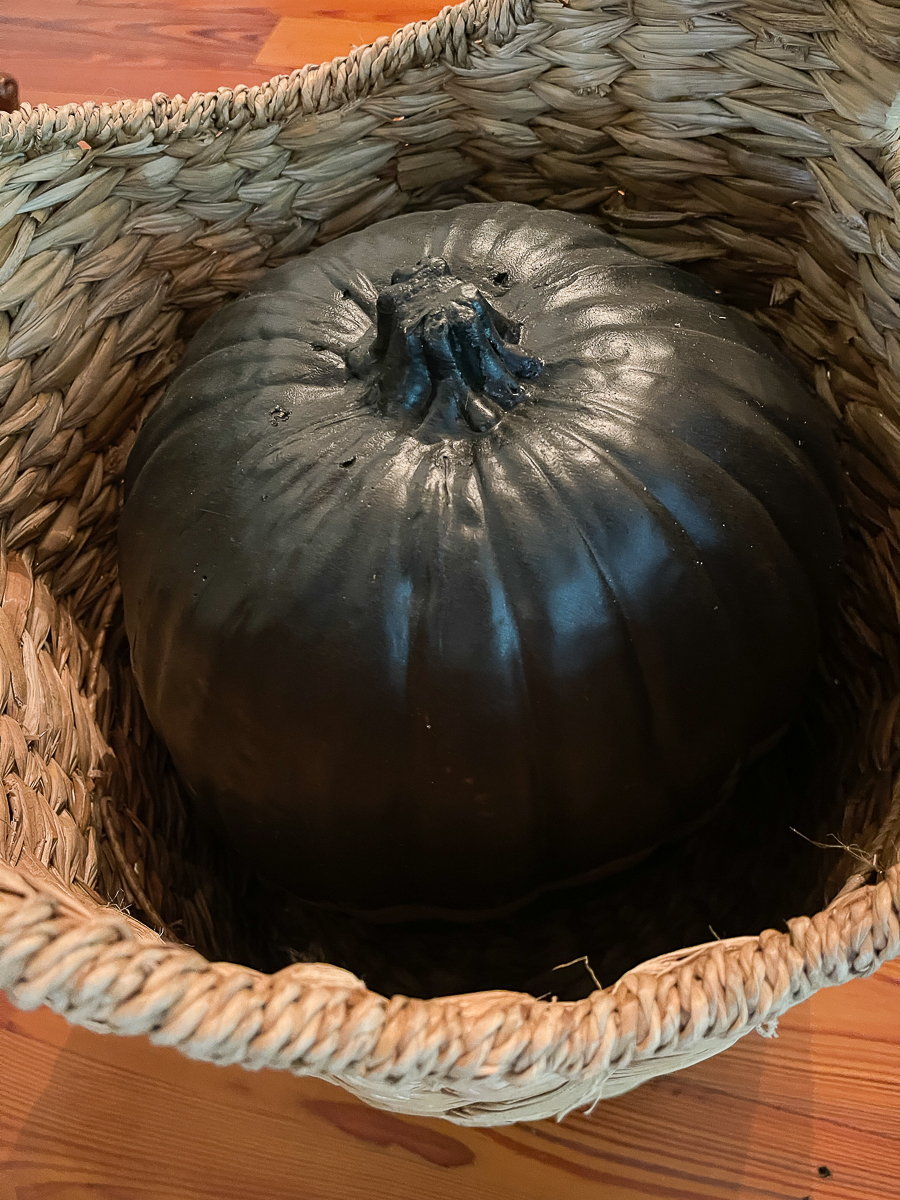black pumpkin filler in a basket