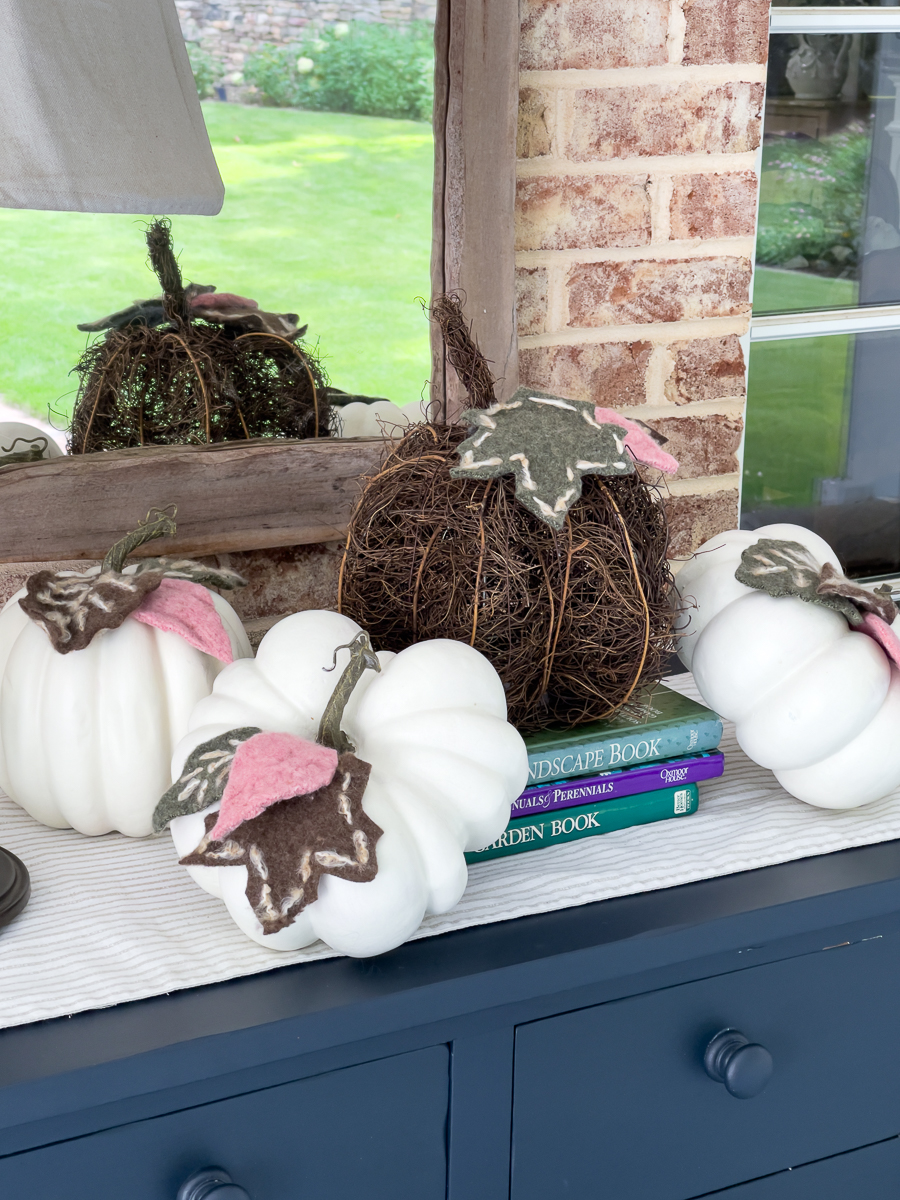 felted leaves on pumpkins