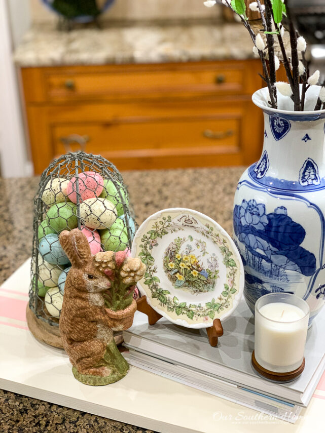 spring vignette with flowers and books
