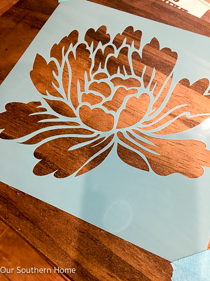 DIY stenciled essential oils storage box is a simple spruce up to unfinished storage.