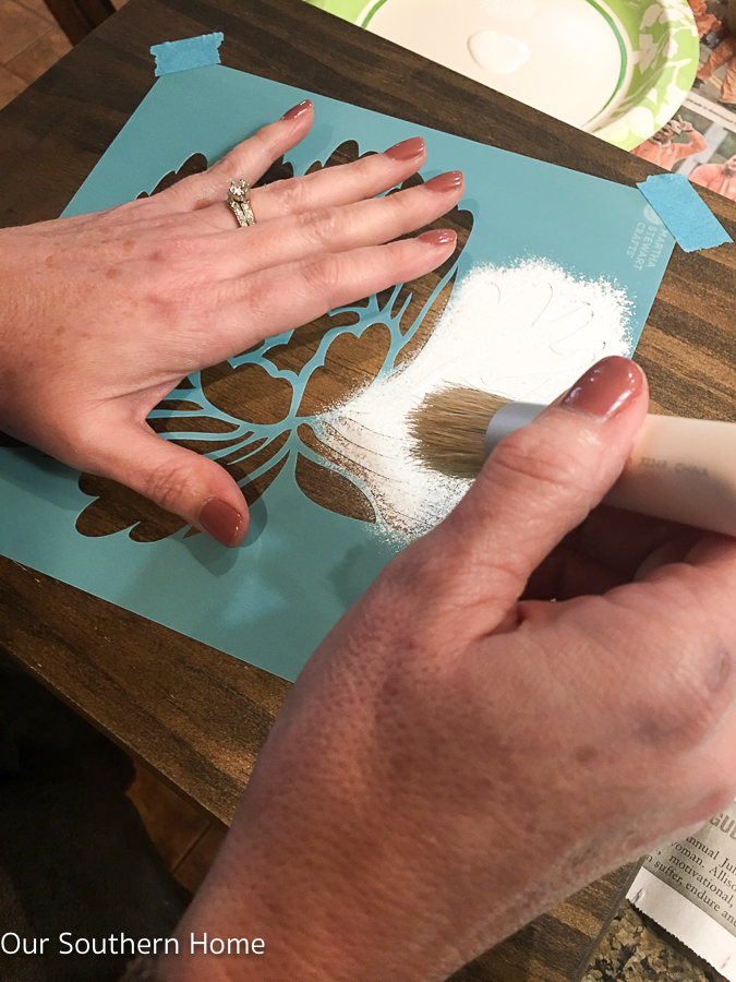 DIY stenciled essential oils storage box is a simple spruce up to unfinished storage.