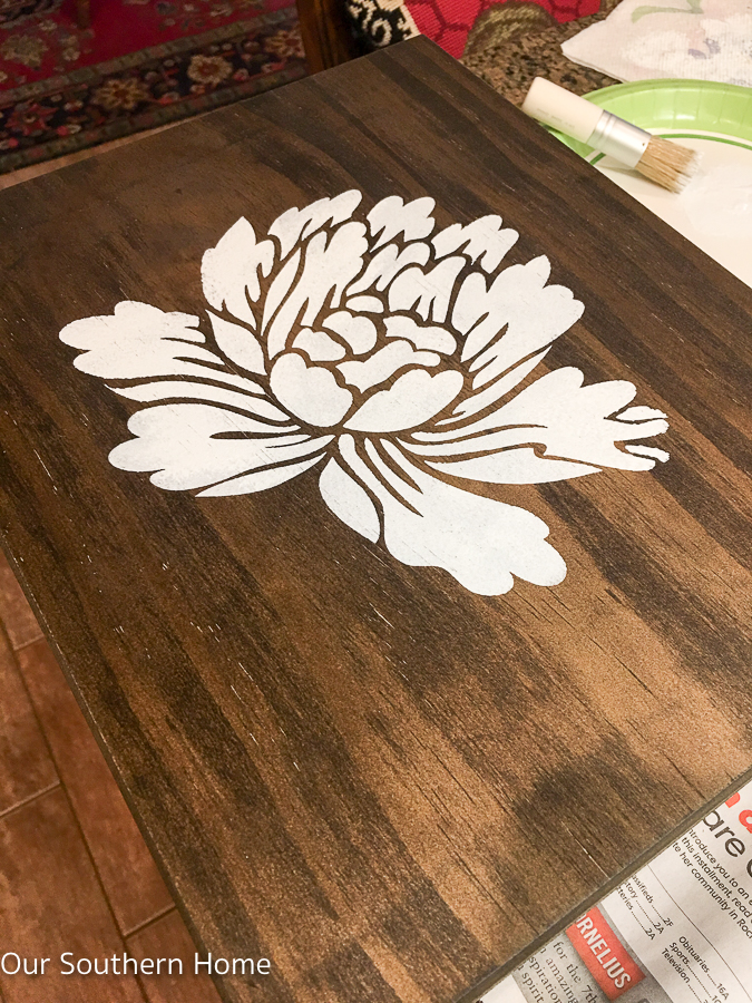 DIY stenciled essential oils storage box is a simple spruce up to unfinished storage.
